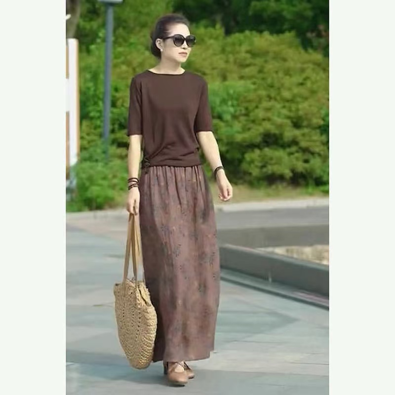 2026 고급 센스 여름 새로운 차가운 니트 스웨터 맨위 우아한 휴가 반신 롱 스커트 외국 가스 두 조각 여성 세트