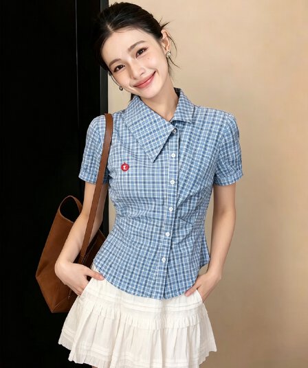 부드러운 부서 아메리칸 2026 여름 새로운 슈퍼 잘 생긴 비스듬한 칼라 몸매 가꾸기 격자 무늬 셔츠 비대칭 여성 셔츠