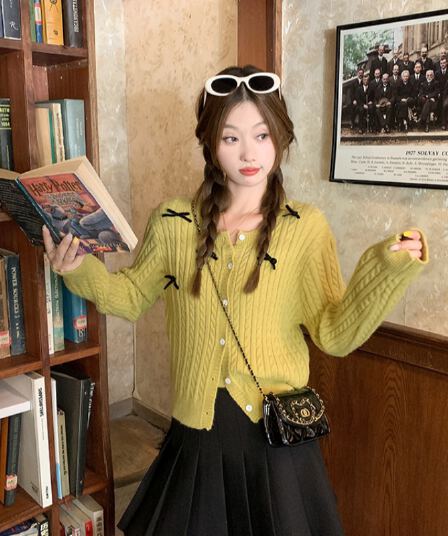 한 부서 나비 매듭 꽈배기 쇼트 스타일 니트 오픈 가디건 경기 슬립 여성 외부 잡아라. 의류 2026 이른 가을 착용 가져 가라. 투피스 세트