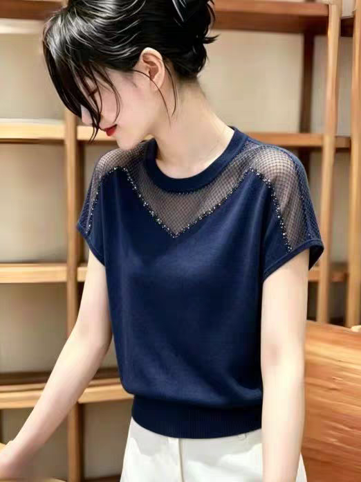 광저우 열세 개 고급 여성 의류 폭발 프랑스식 여름 패션 홀로우 아웃 얇은 스타일 라운드 넥 루즈핏 반팔 니트 스웨터