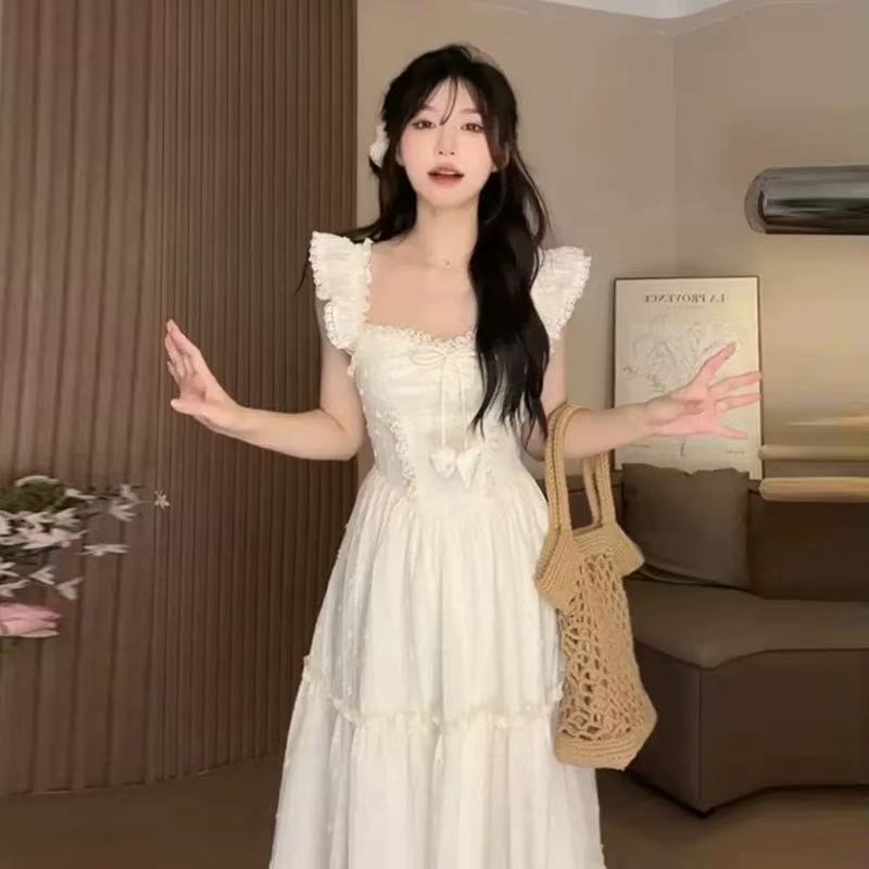 부드러운 바람 여름 여성 드레스 작은 날다 소매 허리 수축 슬림해 보이는 첫사랑 치마 2026 새로운 여성 의류 프랑스식 길다 치마