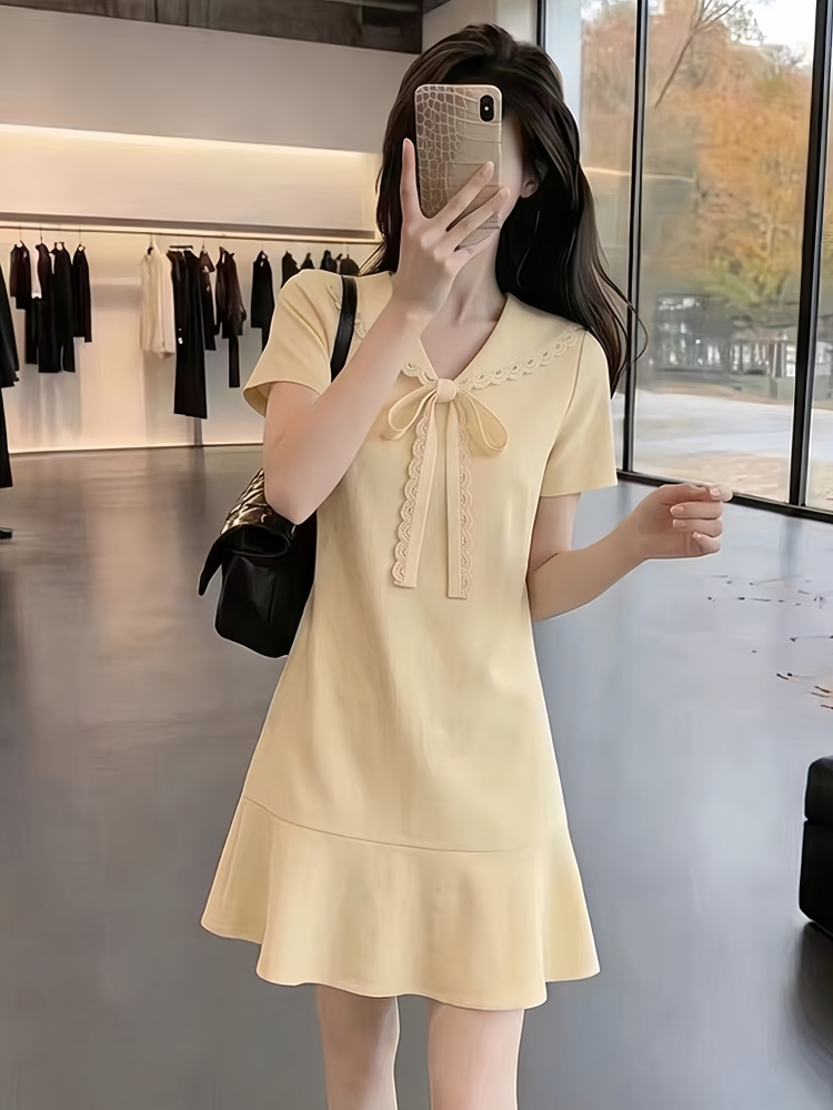 夏日气质特别漂亮小裙子女黄色蝴蝶结短袖收腰a字蕾丝绝美连衣裙   服裝批發女裝批發服飾貨源
