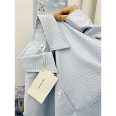 蓝色条纹衬衫女春秋2026新款设计感小众打底衬衣内搭叠穿长袖上衣