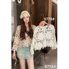 批发法式镂空设计感圆领单排扣短款微透针织衫女新款纯棉百搭长袖上衣