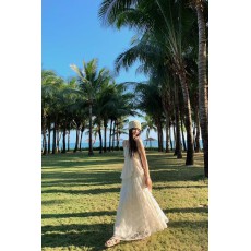 批发2026<b class='q'>夏</b>新款纯色荷叶边V领吊带连衣裙不规则海边度假风长裙