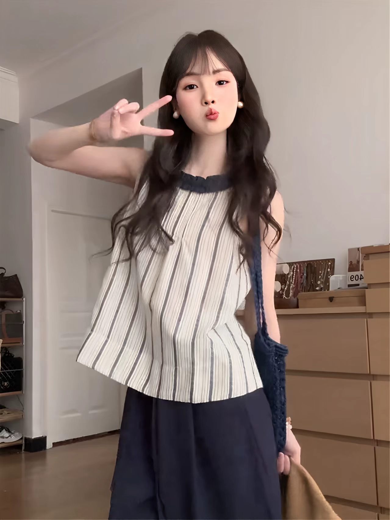 한 부서 여름 착용 가져 가라. 프릴 스트라이프 민소매 맨위 여성 여름 새로운 외출용 조끼 작은 셔츠 디자인 작은 대중