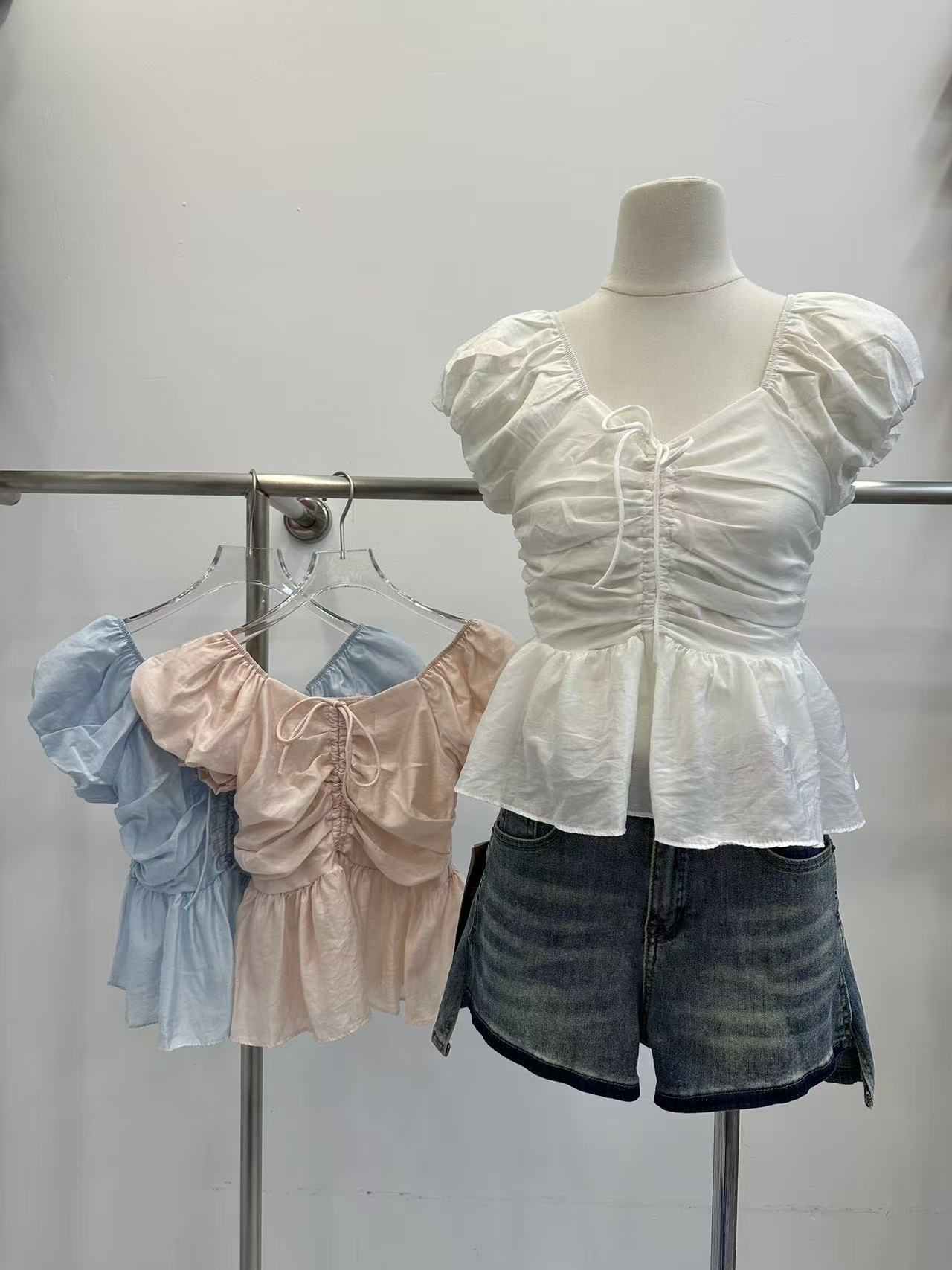 스타일 나비 넥타이 거품 소매 여성 셔츠 봄 2025 새로운 주름 허리 수축 쇼트 스타일 치마 맨위 트렌디