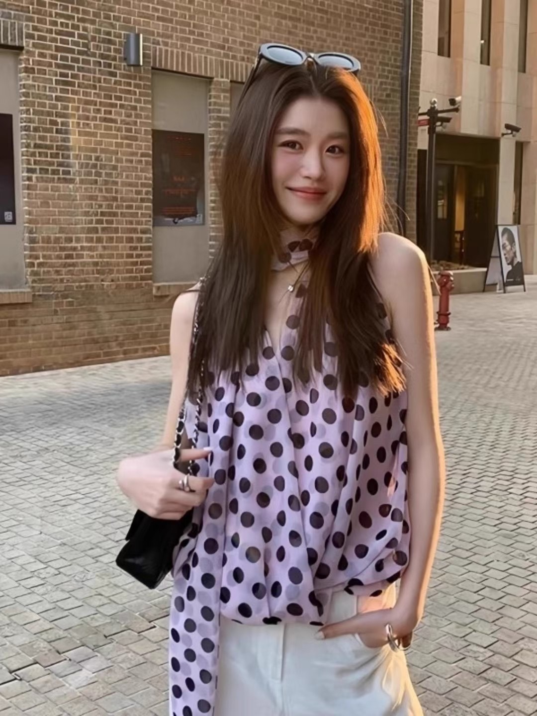 프랑스식 도트 무늬 리본 민소매 쉬폰 조끼 여성 여름 2026 새로운 루즈핏 디자인 센스 품격 맨위