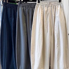 批发2026早春大码<b class='q'>女</b>装设计感抽绳宽松直筒休闲裤透气九分哈伦阔