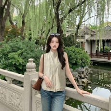批发LelyMooch/夏季叠穿休闲背心胸口镂空菱格铆钉敲扣时髦马甲外套