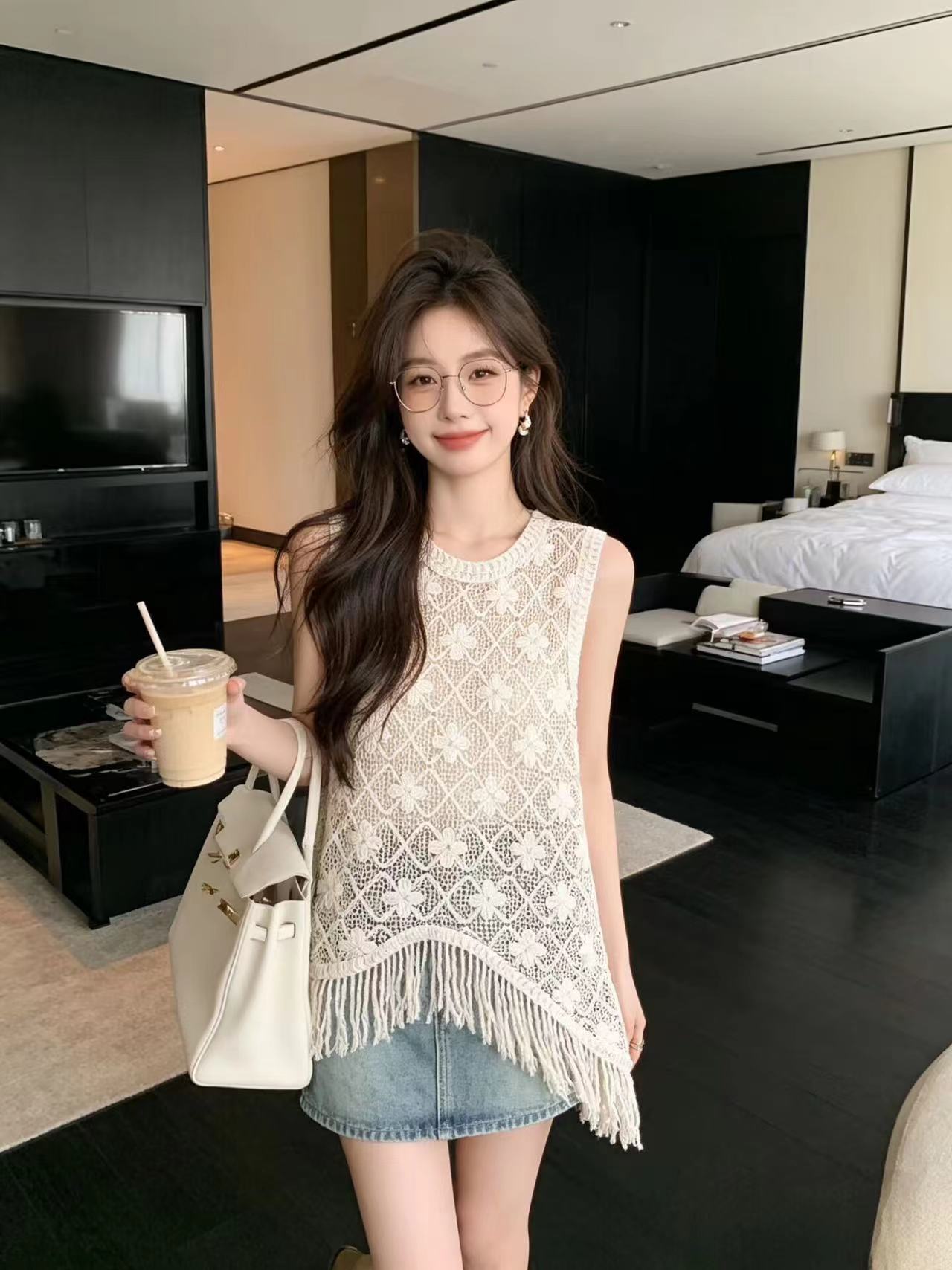여름 새로운 홀로우 아웃 술 라운드 넥 조끼 비스듬한 밑단 민족 스타일 니트 민소매 맨위 일상 프로 피부 통기성