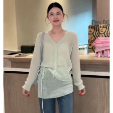 批发超火开<b class='q'>春</b>多巴胺穿搭一整套橘色V领针织开衫叠穿上衣两件套装