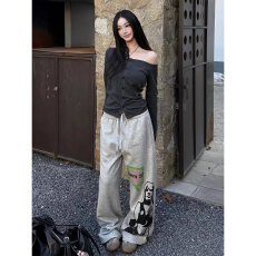 批发韩国chic新款男女美式复古人像印花弯刀阔腿慵懒版型长裤休闲卫裤