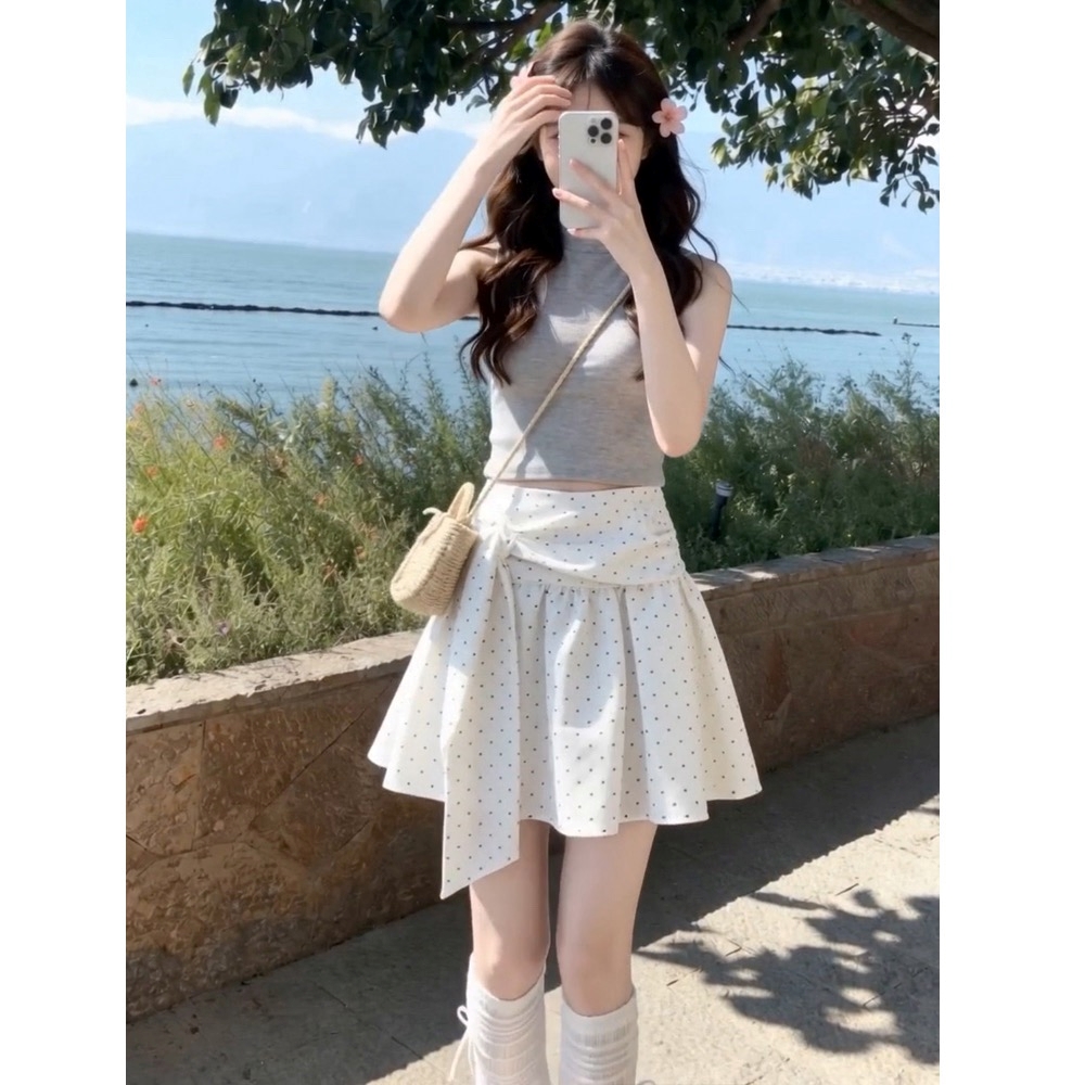한국 스타일 아메리칸 불규칙 도트 무늬 반신 스커트 여성 여름 새로운 레이스업 슬림해 보이는 표지 넓적 다리 한 마디 미니 스커트 플리츠 스커트
