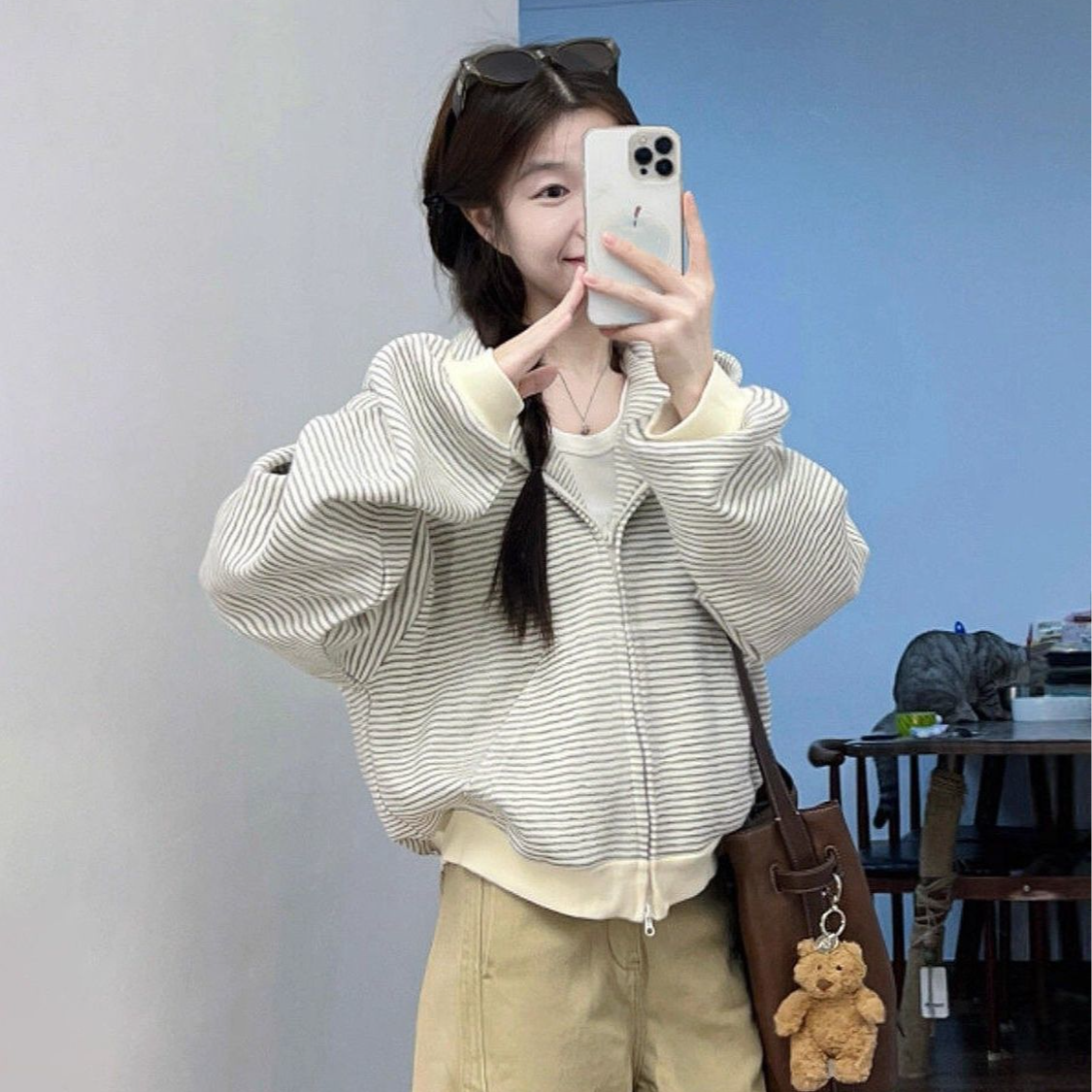 후드 티 스웨터 여성 코트 봄 가을 2025 새로운 한 부서 느긋한 지퍼 스트라이프 오픈 가디건 맨위 이른 가을 착용 가져 가라.
