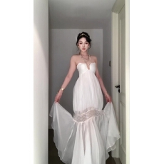 批发<b class='q'>夏季</b>海边度假风超仙气质收腰长裙2026法式白色露背挂脖连衣裙女