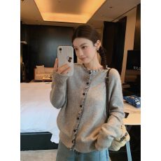 批发韩系白色木耳边针织<b class='q'>开衫</b>毛衣女早春高级感气质宽松慵风懒上衣外套