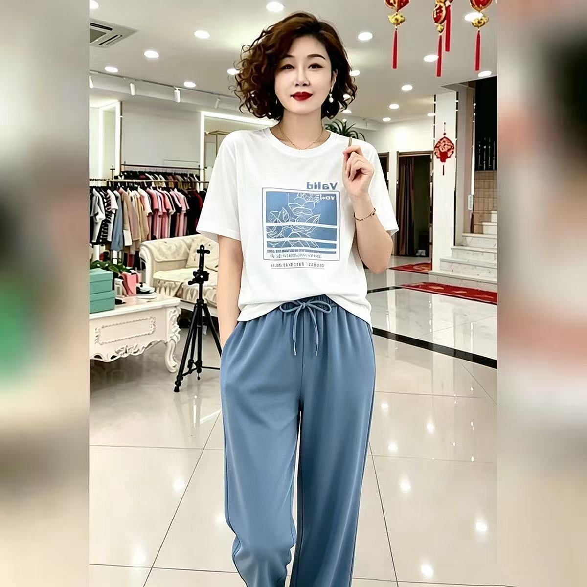 단순한 관대 한 고급 센스 캐주얼 스포츠 슈트 여성 2026 년 여름 반팔 티셔츠 와이드 레그 팬츠 투피스 세트