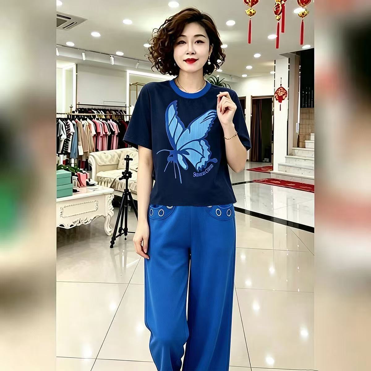 소금 부서 캐주얼 스포츠 슈트 여성 여름 새로운 패션 연령 감소 나비 프린트 반팔 맨위 와이드 레그 팬츠 투피스 세트