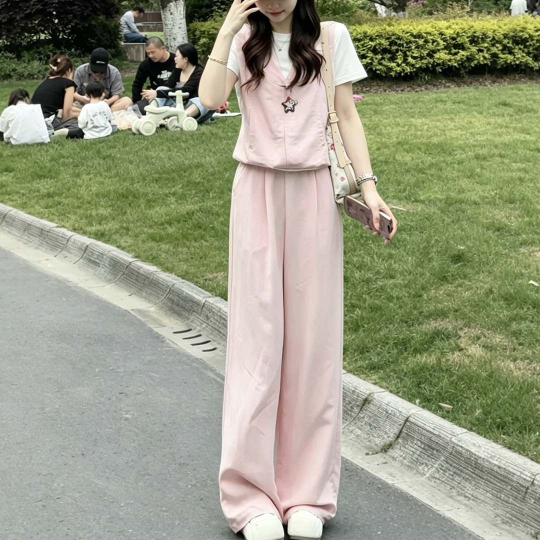 경관 그림 2026 여름 새로운 품격 세트 여성 슬림해 보이는 패션 연령 감소 페이크 레이어드 맨위 와이드 레그 팬츠 투피스 세트