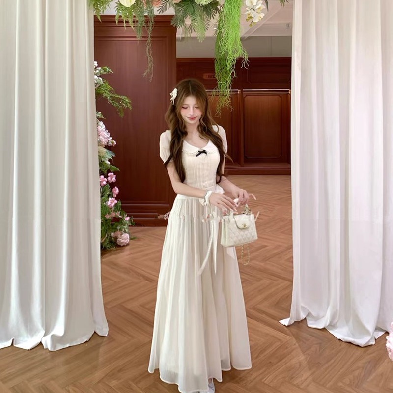 실사 중 동백 나무 달빛 흰색 여름 천 금빛 바람 베이비 칼라 거품 소매 롱 스커트 나비 매듭 스트랩 드레스