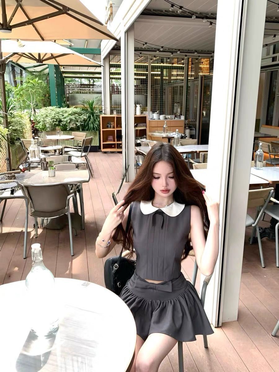 몸매 가꾸기 배색 베이비 칼라 민소매 조끼 맨위 여성 여름 학원 스타일 세트 나비 매듭 반신 스커트 투피스 세트