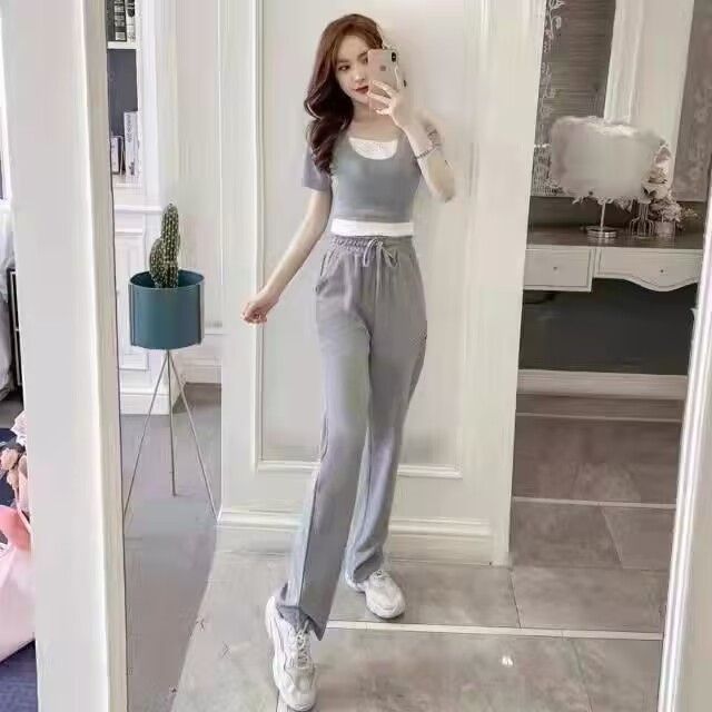 쇼트 스타일 페이크 레이어드 맨위 여름 새로운 느긋한 소금 부서 착용 가져 가라. 인터넷 튀김 거리 스트레이트 캐주얼 바지 세트 투피스 세트