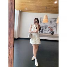 批发2026春季新款收腰显瘦无袖短裙女装法式小众下摆木耳边背心<b class='q'>连衣裙</b>