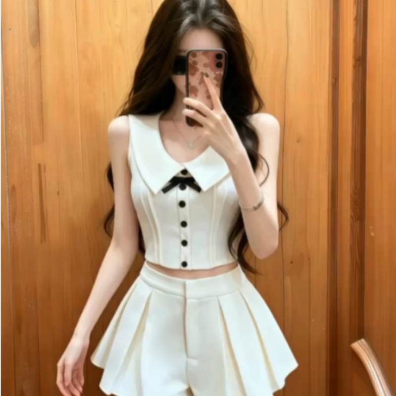 프랑스식 천 금빛 바람 세트 여성 여름 새로운 품격 폴로 칼라 나비 매듭 민소매 조끼 하이웨이스트 미니 스커트 투피스 세트