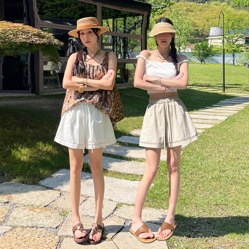 휴가 바람 얼음 실크 아마 반바지 여성 여름 외출용 홀로우 아웃 레이스 측면 루즈핏 캐주얼 바지 넓은 다리 핫 바지
