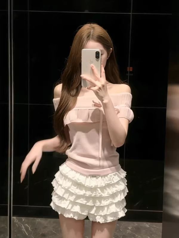 한 부서 달콤함 핑크색 오프숄더 반팔 니트 스웨터 여성 봄 여름 새로운 연령 감소 소녀 센스 착용 가져 가라. 슬림해 보이는 맨위