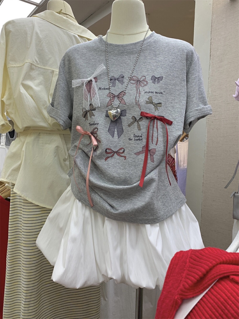 FA33555# 十三行女装韩系甜美立体蝴蝶结印花宽松百搭圆领减龄短袖T恤上衣 服裝批發女裝批發服飾貨源