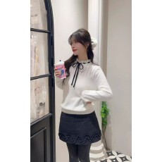 批发邻家女孩2025冬装新款简约百搭显瘦圆领木耳边系带针织衫