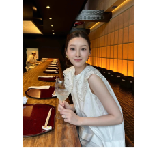 批发白色重工刺绣镂空娃娃领无袖背心衬衫女2025夏季新款别致绝美上衣