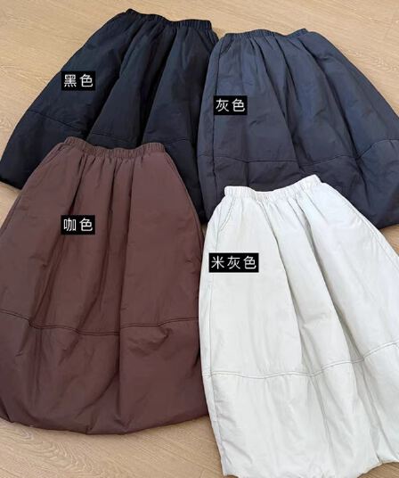 연령 감소 솜을 넣은 두꺼운 꽃밭 치마 2026 겨울 새로운 한국 스타일 보온 미니멀리즘 바람 다용도 반신 스커트 퍼프 스커트