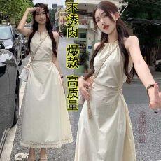 批发爆款设计感镂空露腰挂脖吊带<b class='q'>连衣裙</b>女系带收腰显瘦度假风<b class='q'>流苏</b>长裙