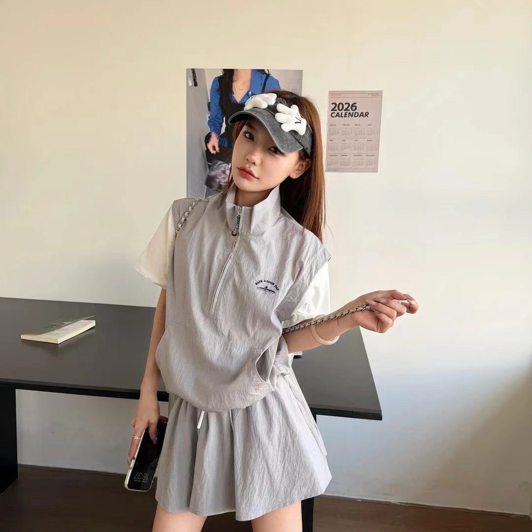 핑크색 페이크 레이어드 배색 패치워크 반팔 맨위 세트 여성 여름 2026 년 새로운 하이웨이스트 치마바지 투피스 세트