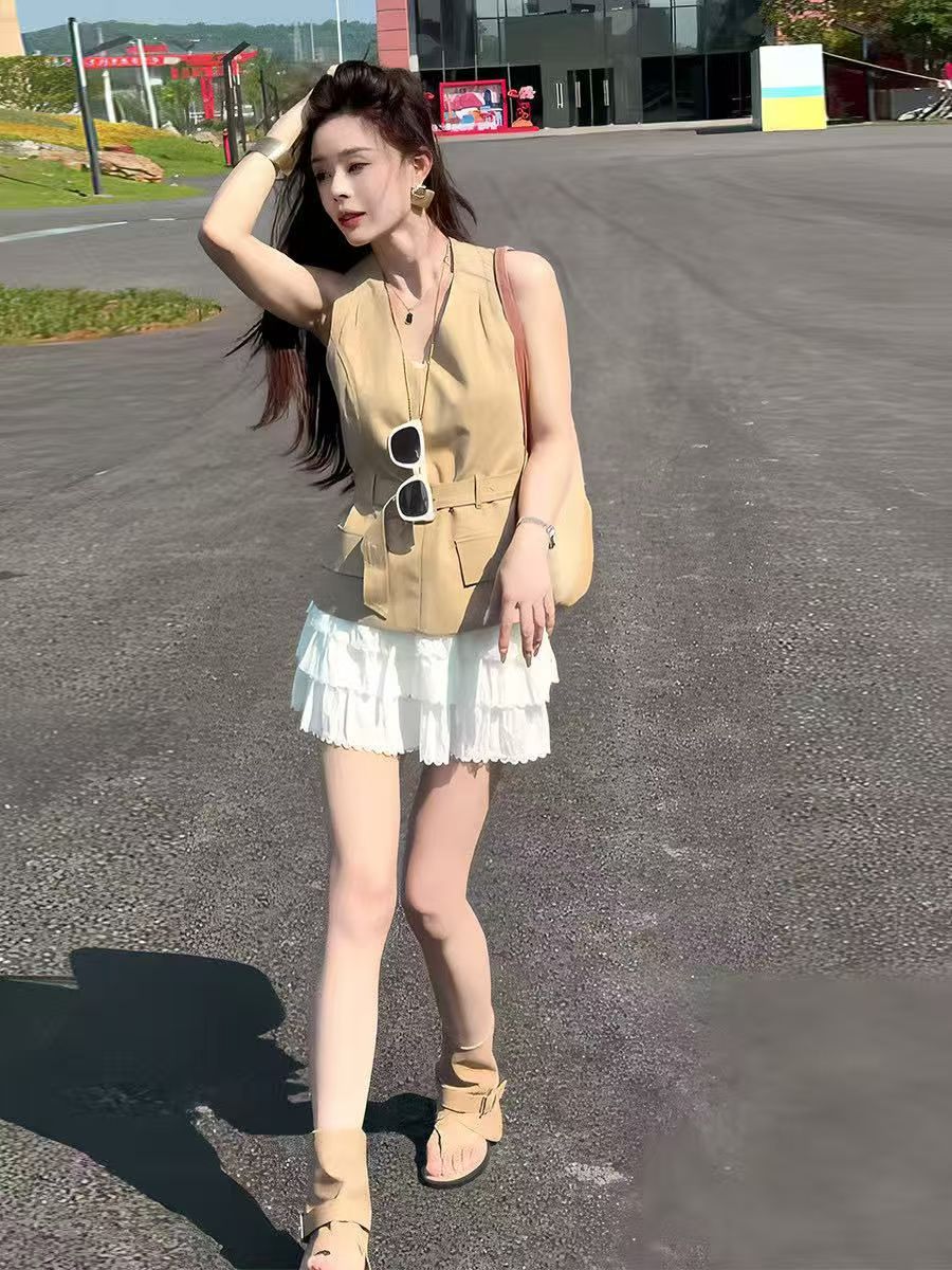 여름 새로운 패션 캐주얼 외국 가스 레이스업 허리 수축 슬림해 보이는 민소매 맨위 반신 치마 세트