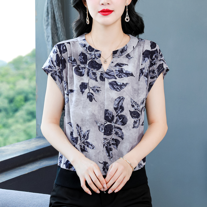 꽃무늬 반팔 여성 셔츠 여름 2026 새로운 패션 슬림해 보이는 연령 감소 표지 고기 디자인 센스 프린트 캐주얼 맨위