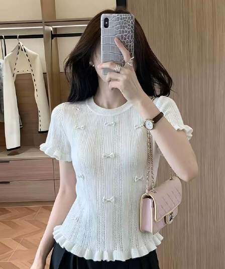 프랑스식 달콤한 매운맛 나비 매듭 홀로우 아웃 Chic 반팔 니트 스웨터 여성 2026 여름 새로운 몸매 가꾸기 프릴 맨위