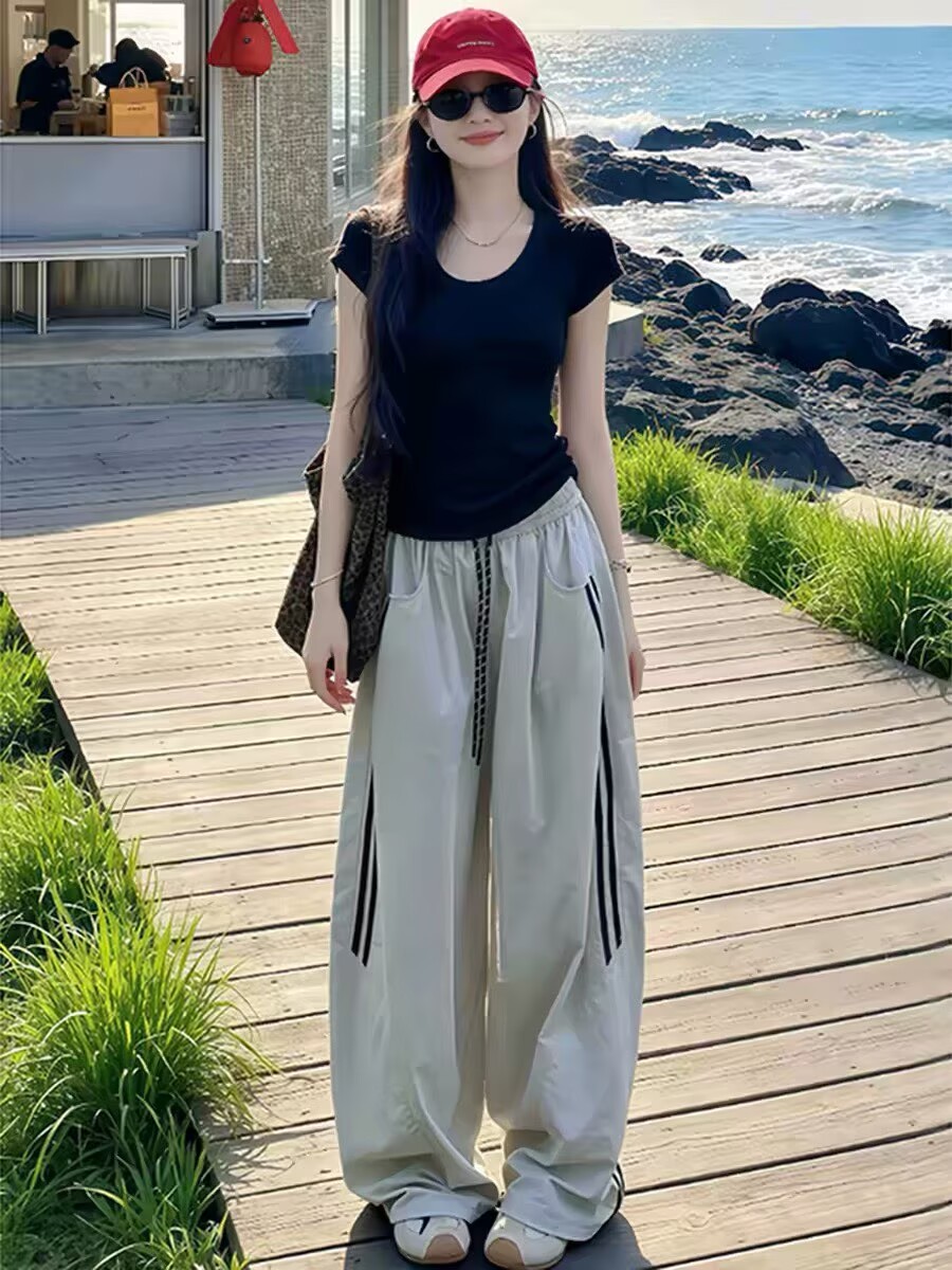 패션 캐주얼 세트 여성 여름 2026 새로운 검정색 반팔 맨위 하이웨이스트 와이드 레그 팬츠 한 부서 슬림해 보이는 투피스 세트