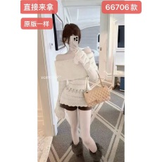 批发法式镂空白色一字肩毛衣女秋冬新款纯欲性感修身针织衫露肩上衣