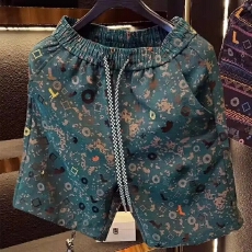 批发美式复古设计感潮牌2025夏季新款顶奢潮流时尚暗纹满印花男士短裤