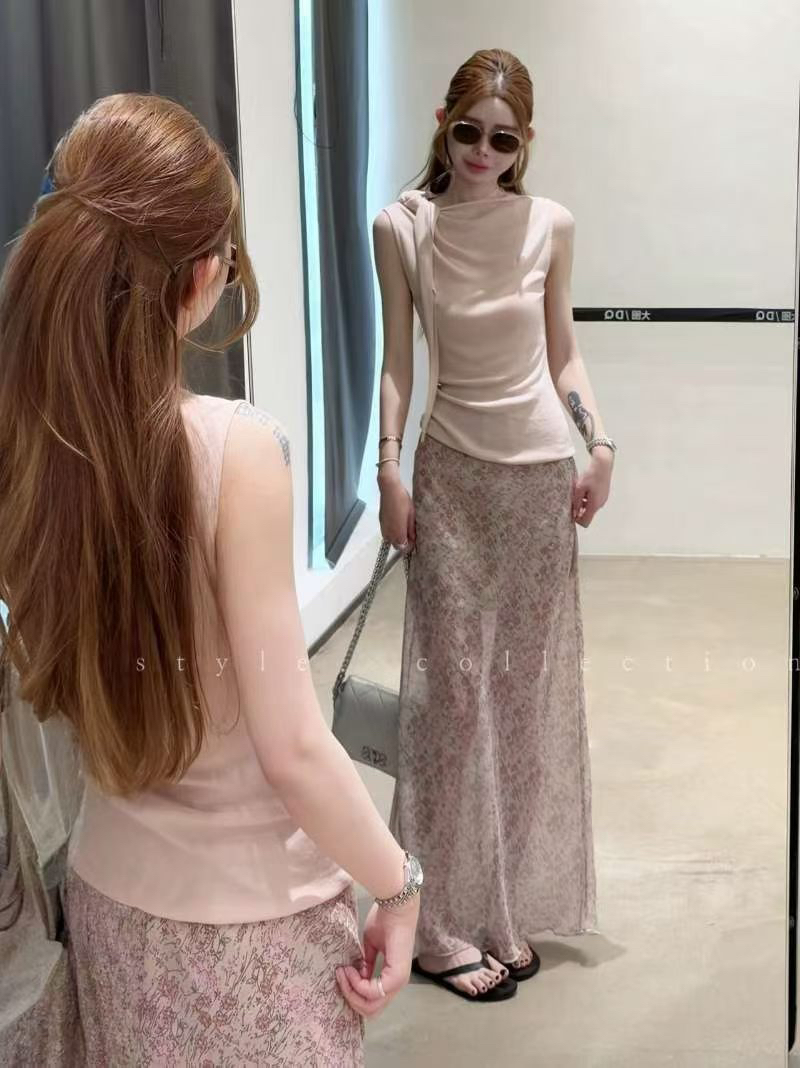 2026 여름 새로운 부드러운 바람 흔들다 칼라 민소매 주름 조끼 맨위 가져 가라. 꽃무늬 반신 스커트 품격 투피스 세트