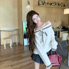 一字肩蝴蝶结针织衫女秋季流行爆款修身纯欲露肩毛衣上衣