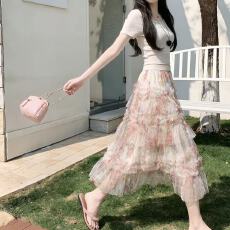 批发度假碎花网纱<b class='q'>半身裙</b>女2026新款设计感<b class='q'>不规则</b>钉珠a字大摆沙滩长裙