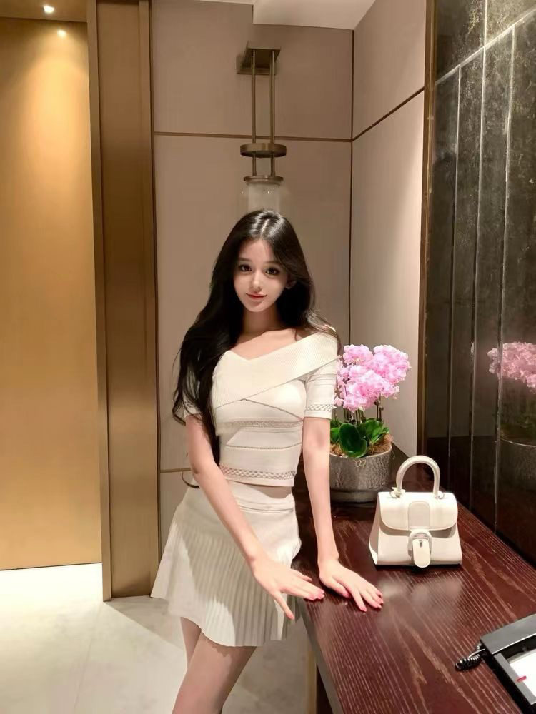 순수한 욕망 품격 여름 작은 흰색 꽃 니트 세트 여성 봄 여름 새로운 오프숄더 맨위 플리츠 스커트 두 조각