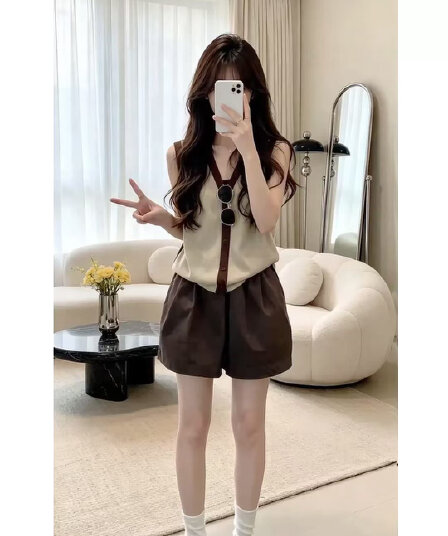 한 부서 디자인 센스 홀로우 아웃 폴로 칼라 민소매 조끼 모방 아마 니트 오픈 가디건 여성 여름 새로운 느긋한 맨위