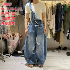 批发新款<b class='q'>韩版</b>时尚宽松显瘦休闲百搭洗水弯刀牛仔<b class='q'>背带裤</b>女