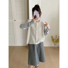 批发白色针织马甲背心女秋冬新款韩系外搭叠穿宽松圆领单排扣坎肩毛衣